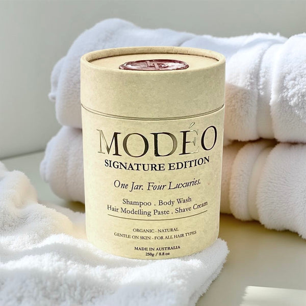 MODÉO Signature edition. One rich foaming cream. 4 essentials in one jar: Shampoo. Body wash. Modelling Paste. Shave cream
